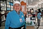 Retired civil servant Suchat -E-la volunteers at Radchanakarin Hospital in his native Narathiwat province. Fluent both in Thai and in Yawi (Thai Muslim Malay), Suchat assists communication between patients and doctors. [Bas Pattani/Khabar]